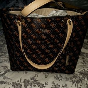 Med size brand new Guess purse